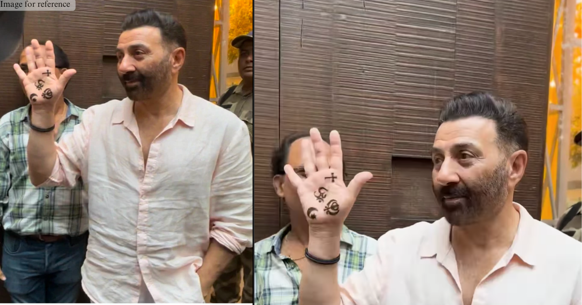 Sunny Deol flaunts his mehendi design while greeting paparazzi at his son's mehendi ceremony